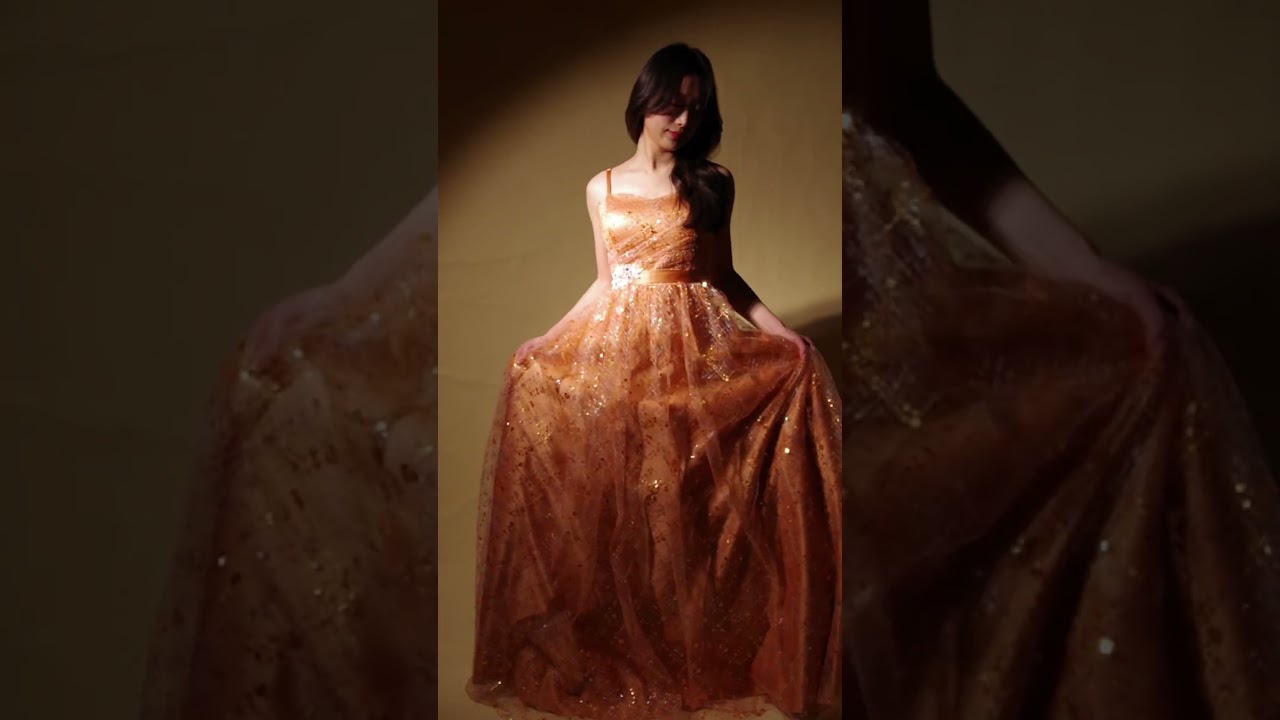 華やかさ満点のビタミンオレンジカラーの総スパンコールのキラキラ