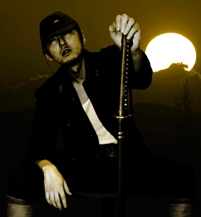 iFLYER: 剣桃太郎 / About - LIVE